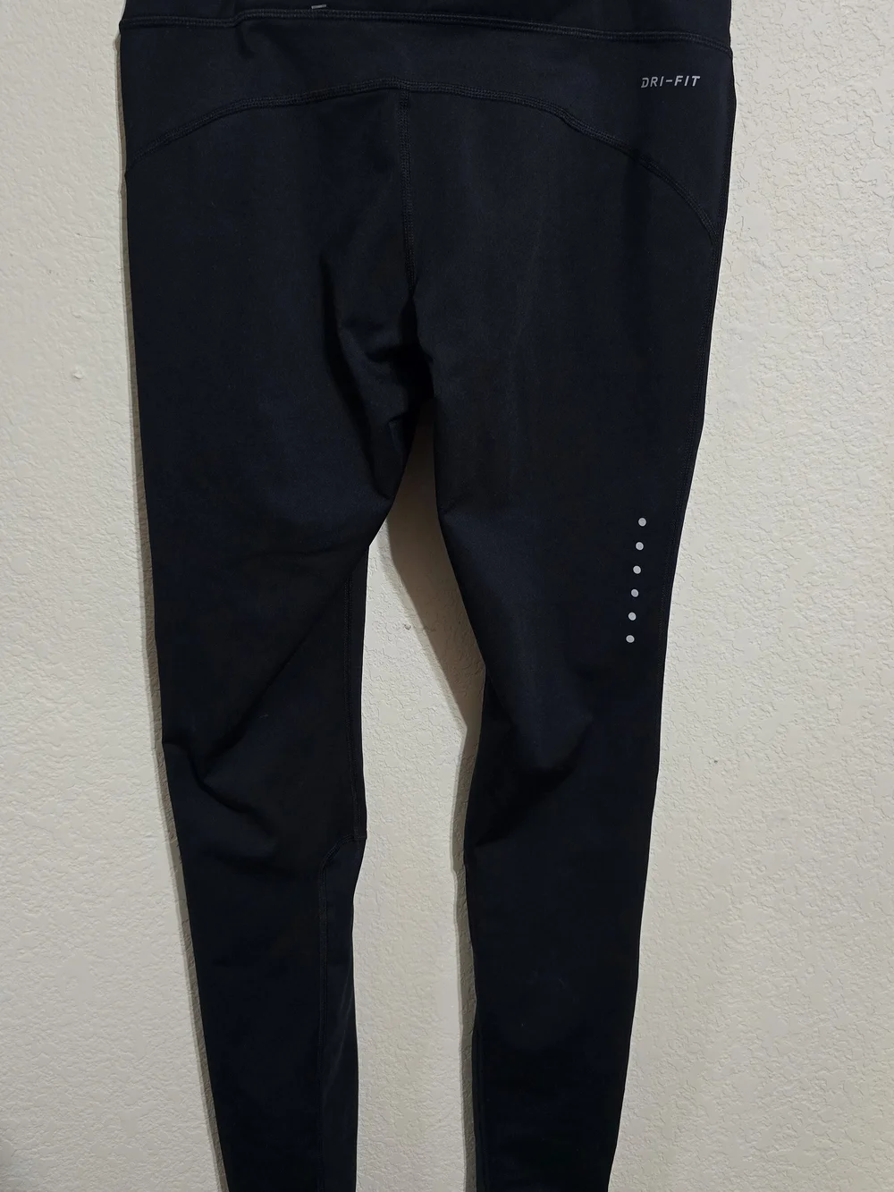Nike Women's Black Athletic Leggings with Reflective Swoosh